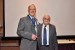 Dr. Nagib Callaos, General Chair, giving Dr. Russell Jay Hendel an award "In Appreciation for Delivering a Great Keynote Address at a Plenary Session."